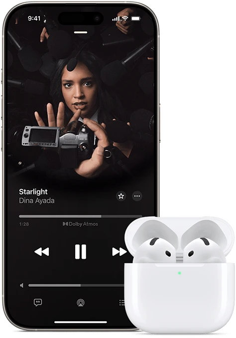 iPhone next to AirPods Pro in charging case, case is open