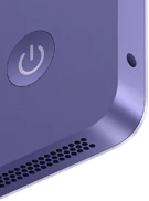 جهاز iMac، الجهة الخارجية الخلفية، لون ليلكي، الميزات: زر التشغيل، ومقبس لسماعات الرأس، والغطاء الشبكي لمكبر الصوت