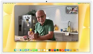 Desk View demonstration. Person on a video call watching top-down view of a baker decorating a cookie