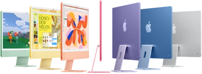 Seven iMac models in colors green, yellow, orange, pink, purple, blue, and silver, in an accordion arrangement