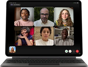 iPad Air, attached to Magic Keyboard, Black color, Group FaceTime call on screen