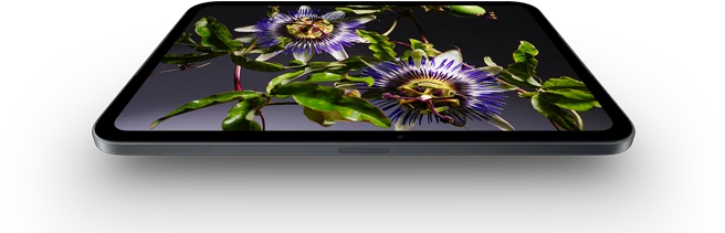 iPad mini, 8.5-inch OLED display, bright and deep blacks, showing a person wearing a hat and jacket