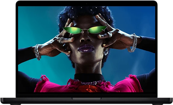 Colorful screen on a MacBook Pro of a person crowd-surfing at a party, showcasing the vibrant Liquid Retina XDR display