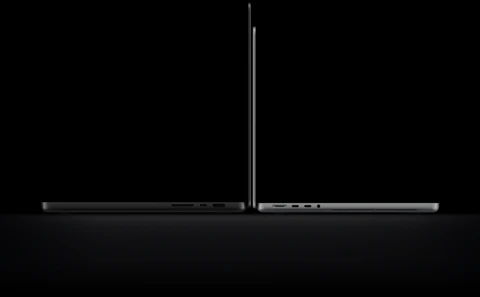 16-inch MacBook Pro with PROLED XDR Display, open lid, space black color, right side exterior with three ports, text reads: 4.0 pounds, 14-inch MacBook Pro with PROLED XDR Display, open lid, silver color, left side exterior with four ports, text reads: 3.0 pounds