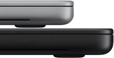 14-inch MacBook Pro with PROLED XDR Display, silver color, stacked on top of 16-inch model, space black color, showing size difference